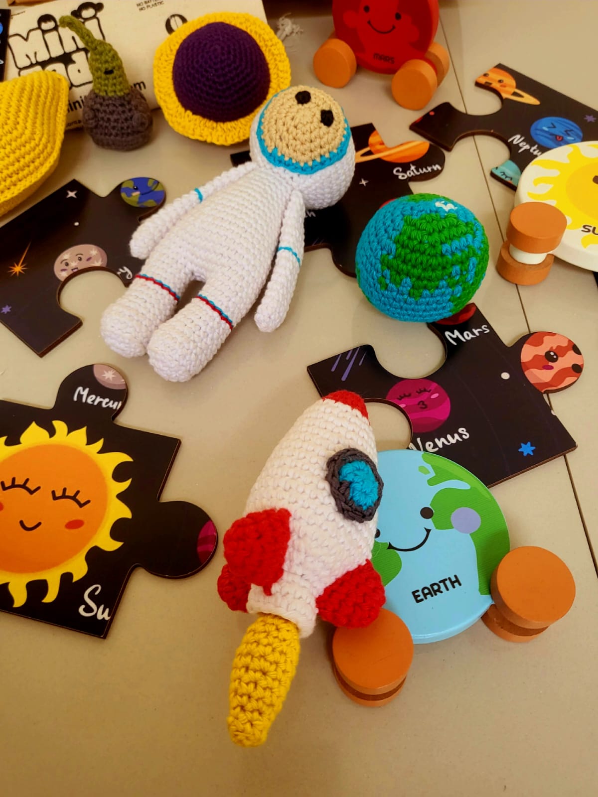 MiniTads Handmade Astronaut Crochet Toys ➕️ MiniTads Planet roller coasters ➕️ MiniTads Solar system Puzzle with flash card ..Space Adventure for Little Dreamers! – Wooden and Crochet Solar System Playset...